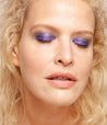 Model with light skin tone wearing Colorwand in costas on her eyes.