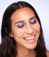 Model with medium skin tone wearing Colorwand in costas on her eyes.