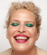 Model with light skin tone wearing Colorwand in figeater on her eyes.
