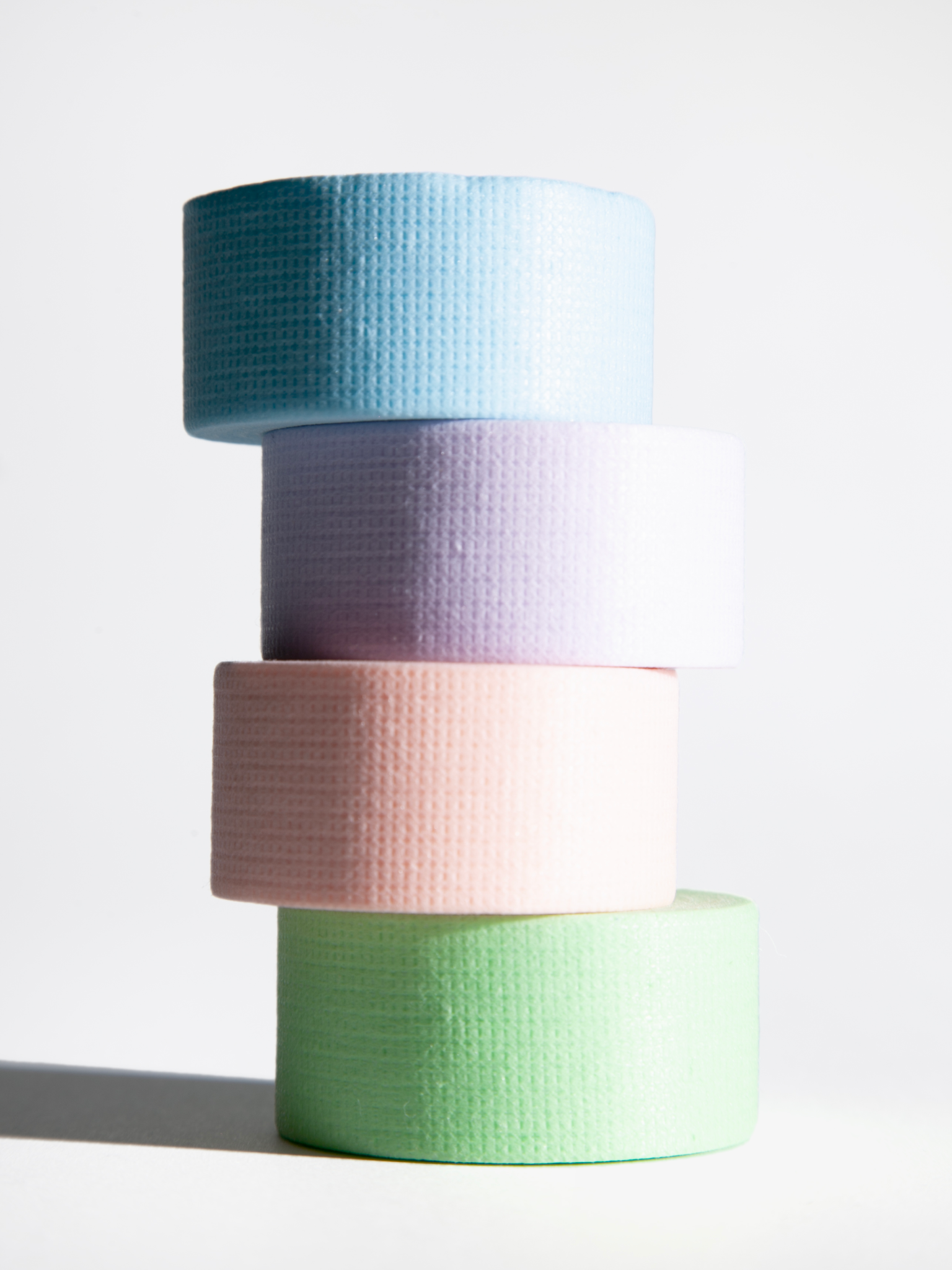 Humanoid Tape stacked on top of each other. Sky, Lilac, Peony,Mint
