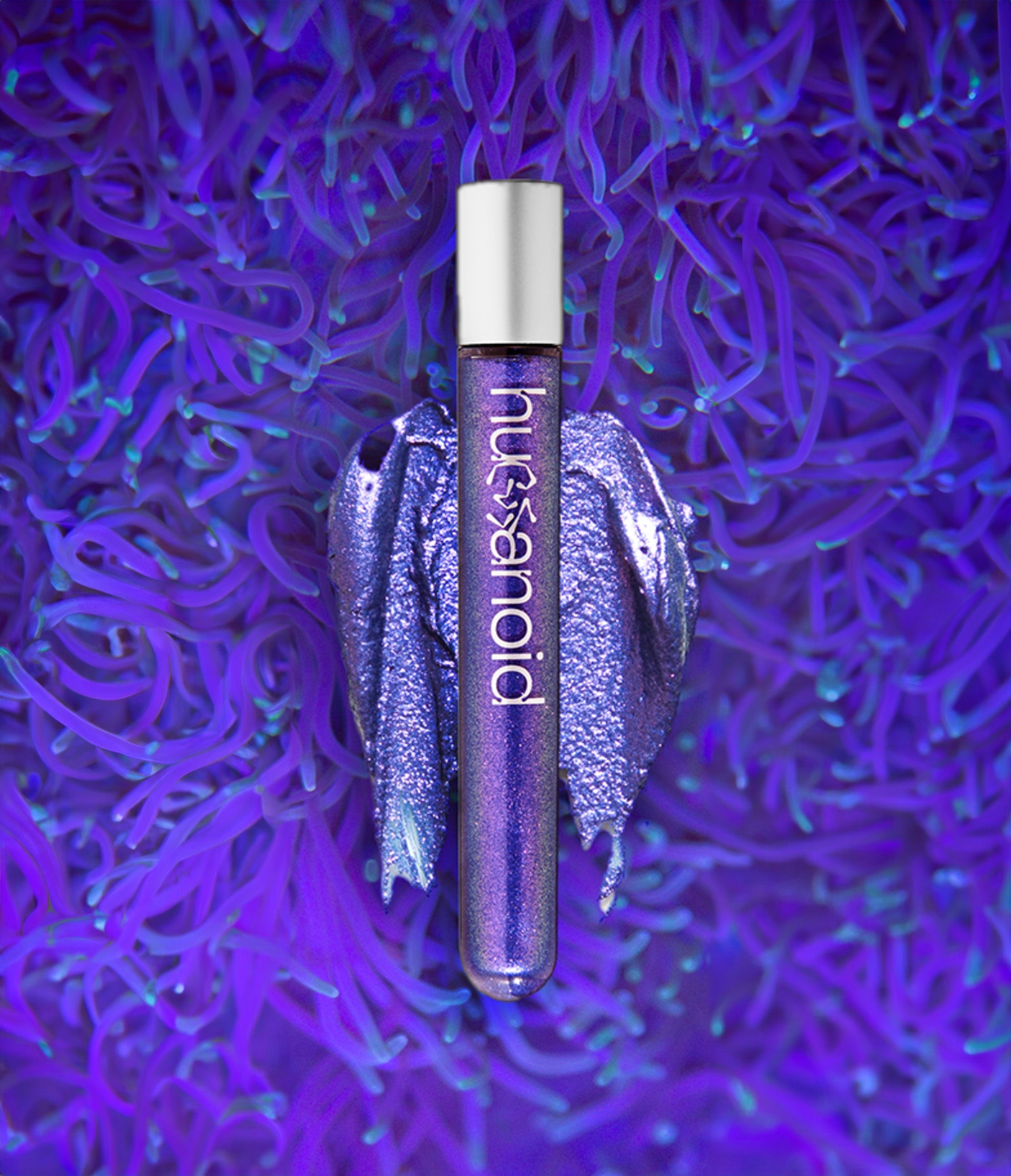 Close-up of Colorwand in Costas, a rich indigo duo-chrome with fuschia and gold metallic shimmer