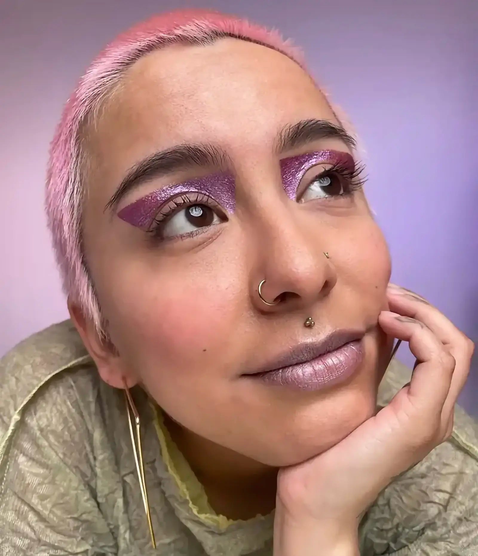 var:glabra | close-up of glabra gel wand makeup worn on eyes showing copper metallic finish
